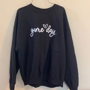 Ladies Gildan  brand heavy blend black sweatshirt with game day logo